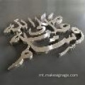 Art tal-ħajt tal-metall Musulman imqaxxar